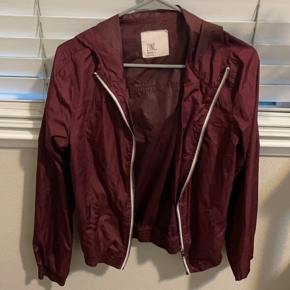 Red windbreaker